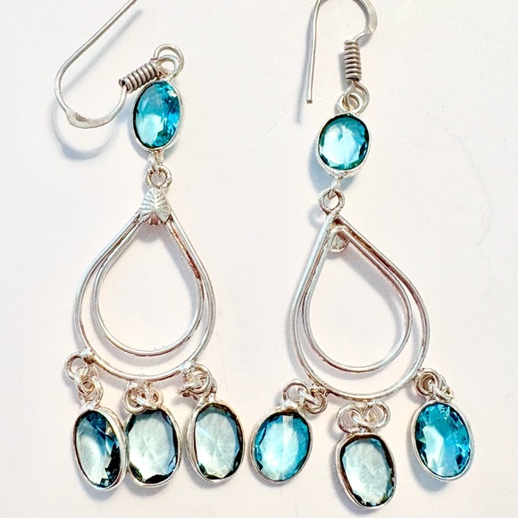 Jewelry - 2 inch, delicate, silver, Blue Topaz earrings.
